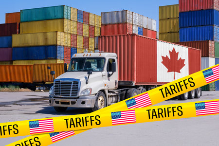 A Canada-marked shipping container on a truck, blocked by US 'Tariffs' tape, symbolizing the trade war's impact on Canada-US relations - Montageの写真素材