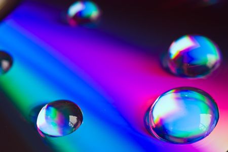 water drops on a dvd diskの写真素材