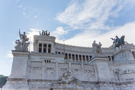 detail view of the altar of the fatherland at piazza venezia in rome italy on sunny day with blue sky and cloudsの写真素材