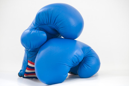 Two boxing gloves resting on each otherの写真素材
