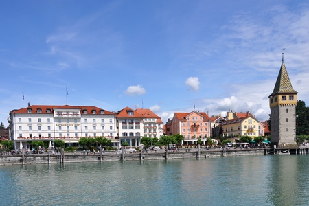 Promenade at Lindau Lake Constance with historically Mangturm seen from the harbor basinのeditorial素材