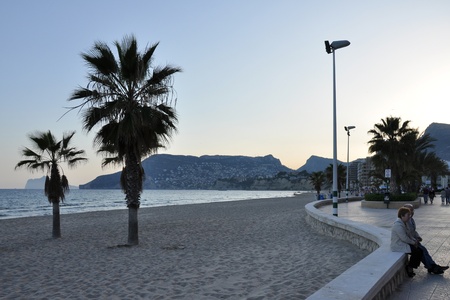 Evening at the beach in Calpe at the spanish Mediterranian Sea coast Costa Blancaの写真素材
