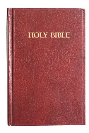 Front of the Holy Bible. On white background.の写真素材