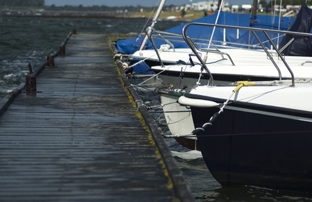 Front of ships lying in a Dutch harbourの写真素材
