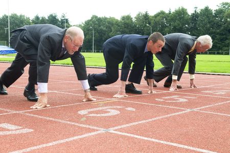 Group of businessmen are ready for the start of the run.の写真素材
