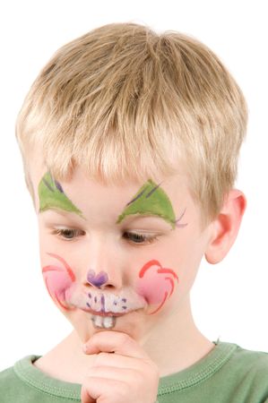 Child with his face painted as a rabbit.の写真素材