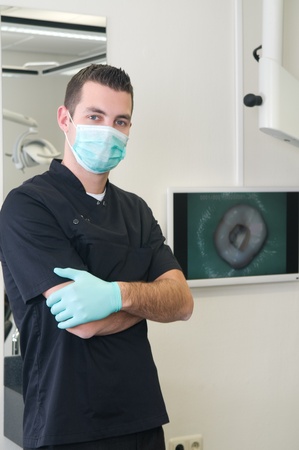 Portrait of a dentist in his dental practiceの写真素材