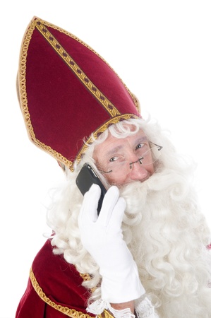Sinterklaas using a mobile phoneの写真素材