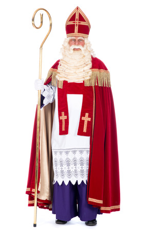 Portrait of Santa Claus with staff, on a white の写真素材