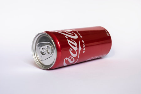 Coca-Cola is a carbonated soft drink sold in stores, restaurants, markets and vending machines around the world.のeditorial素材