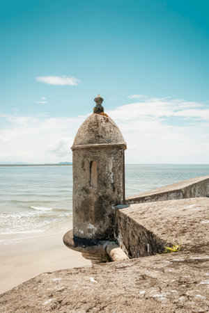 An ancient fortress by the beach. Built in a long time gone by, stands tall and proud on the edge of the beach.のeditorial素材