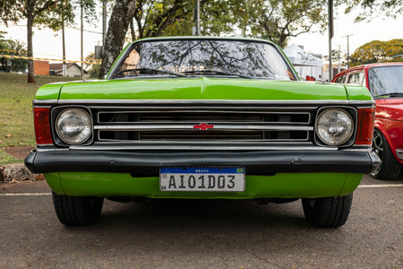 Vehicle Chevrolet Opala 4100 (1973) on display at a vintage car fair show in the city of Londrina, Brazil. Annual vintage car meeting.のeditorial素材