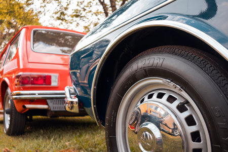 Detail of the front wheel of a vehicle Volkswagen TL 1972 on display at a vintage car fair show in the city of Londrina, Brazil. Annual vintage car meeting.のeditorial素材
