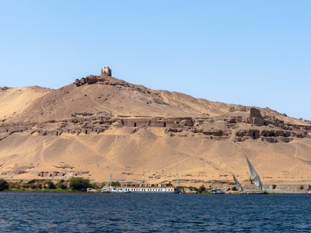 Traditional Egyptian felucca cruise sailing down the great Nile River in Egyptの写真素材