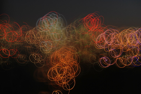 BARCELONA, SPAIN - NOVEMBER 2017: Blurry building lights in the horizon at night seen in colorful circlesのeditorial素材