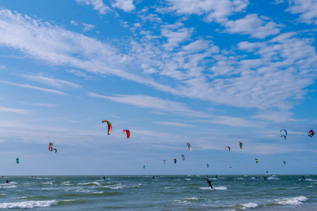 many kite surfers on the seaの写真素材