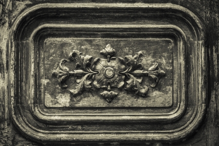 Very old looking detail wooden door ornament の写真素材
