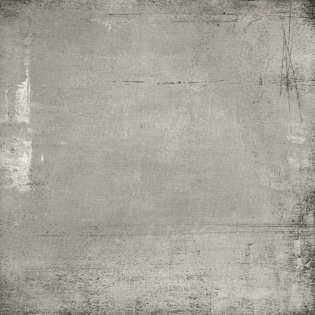 Old paper against grey textured background の写真素材