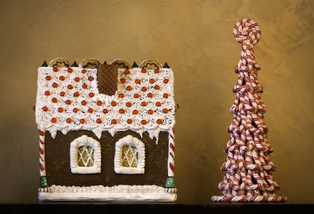Gingerbread house on brown backgroundの写真素材