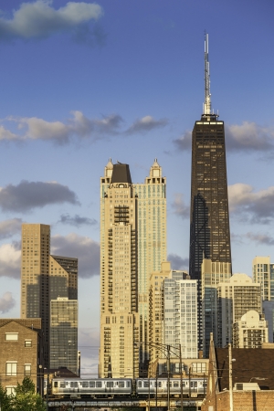 Downtown of Chicago with blue sky and trainの写真素材