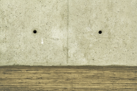 Concrete crack wall and brown hardwood floorの写真素材