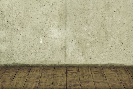 Concrete crack wall and brown hardwood floorの写真素材