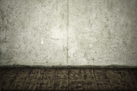Concrete crack wall and brown hardwood floorの写真素材