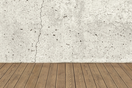 Concrete crack wall and brown hardwood floorの写真素材