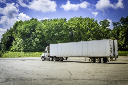 Truck with trailer on the parking lotの写真素材