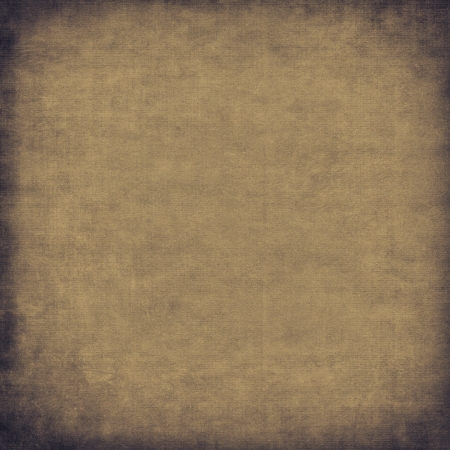 Vintage old paper background with vignetteの写真素材