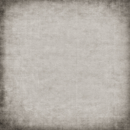 Vintage old paper background with vignetteの写真素材