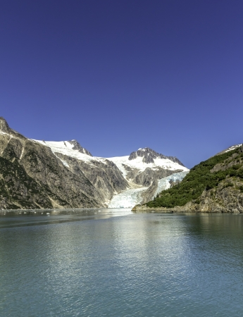 Glacier bay with clear blue skyの写真素材