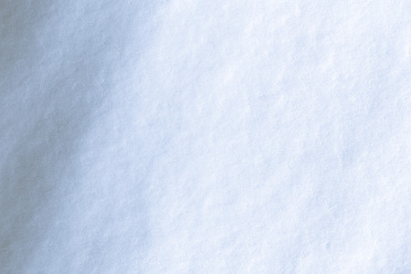 Fresh snow surface with shadowsの写真素材