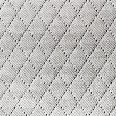 Background of textile texture with diamond pattern decorationの写真素材