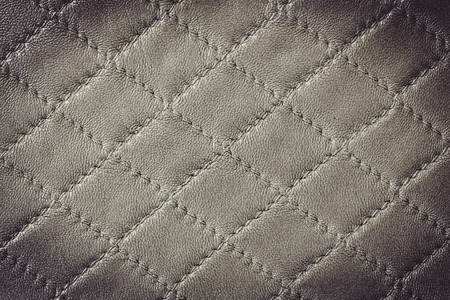 Vintage leather texture with diamond pattern decorationの写真素材