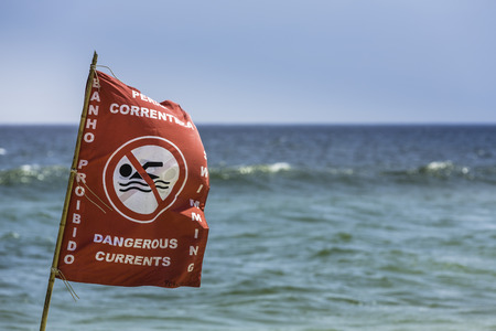 Danger currents beach sign in Rio de Janeiro ,Brazilの写真素材