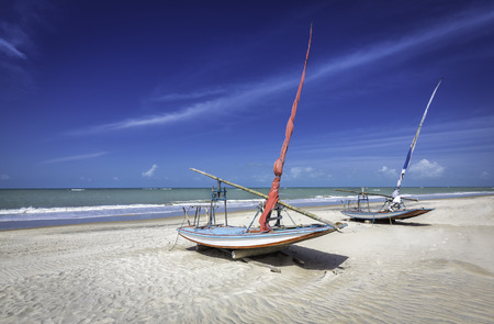 Fishing boats on the beach of Natal, Brazilの写真素材