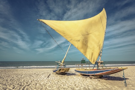 Fishing boat on the beach of Natal, Brazilの写真素材