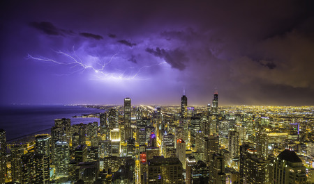Chicago downtown night panorama during thunderstormの写真素材