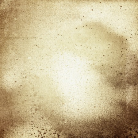 Old paper with spots and scratchesの写真素材