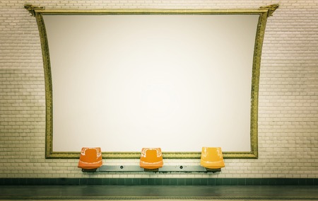Empty billboard in Paris subway station with empty chairs Empty billboard in Paris subway station with empty chairs