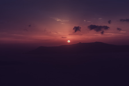 Famous sunset above Caldera view over sea in Santorini Island, Greeceの写真素材