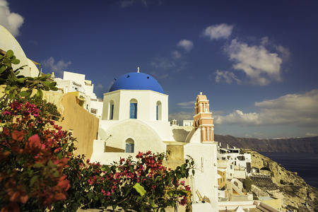 Santorini Island  with  blue dome church in Oia village, Greeceの写真素材