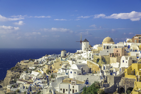 Amazing village of Oia with white cave homes in Santorini Island, Greeceの写真素材