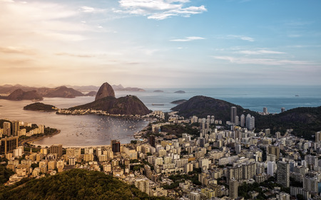Beautiful panorama of Rio de Janeiro during sunset with red light leak, Brazilの写真素材