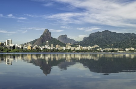 Sunrise over mountains in Rio de Janeiro with water reflection, Brazilの写真素材