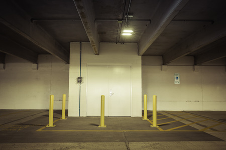 Empty parking garage metal doorの写真素材