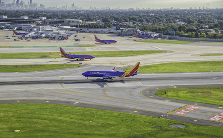 Aerial view of Busy Southwest Airport Terminal in Chicago With Jetsのeditorial素材
