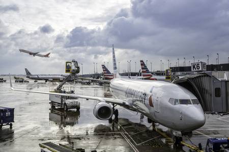 CHICAGO,UNITED STATES - JANUARY 22: Deicing of the American Airlines planes before take off on January 22, 2016 in Chicago. Deicing on O'Hare International Airport due to cold and snowy conditions.のeditorial素材