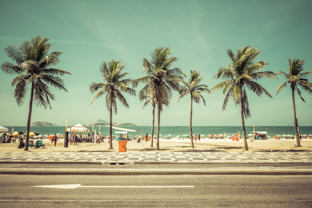 Sunny day with Palms on Ipanema Beach in Rio De Janeiro, Brazil. Vintage colorsのeditorial素材